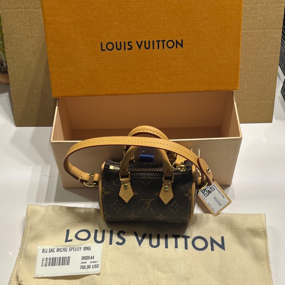 Authentic New Louis Vuitton Monogram Micro Speedy with Tan Trim Bag Charm. OBO